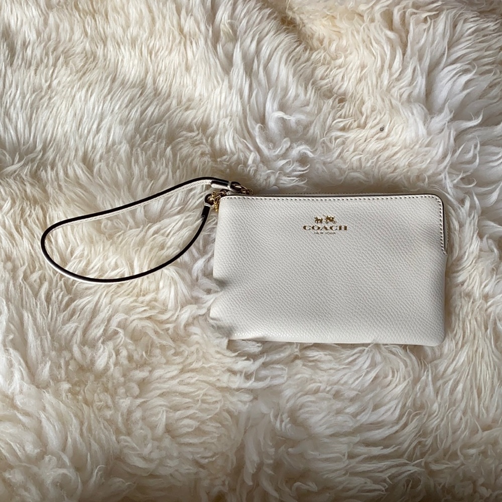 White hand bag